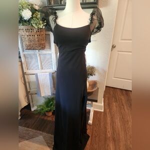 Elegant Black Dress with Sheer Sleeves